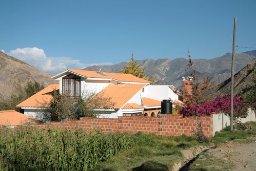 Farm House with corn field in front in the Mountains of South America, Bolivia