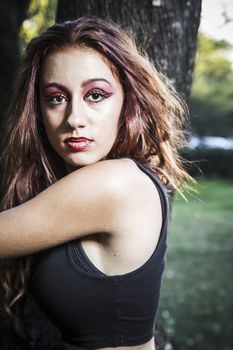 beautiful girl in a vintage style in a fabulous autumn park