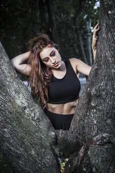 beautiful girl in a vintage style in a fabulous autumn park