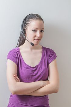 early twentie woman wearing a phone headset