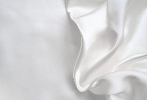 Smooth elegant white silk can use as wedding background 
