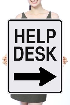 A woman holding a a modified one way sign indicating Help Desk