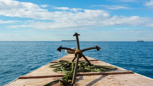 The anchor of a small boat pointing in the direction of Changuu Islands which is located on the Indian Ocean near Zanzibar, Tanzania