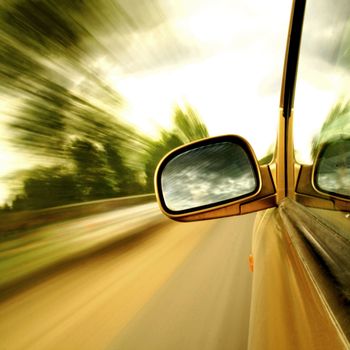 Side mirror view driving in forest road