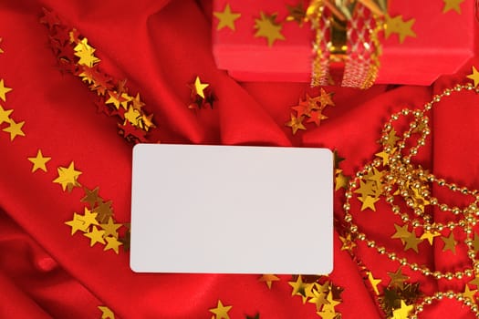 A Red gift with the visiting card