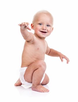 Cute baby boy in diaper over white background