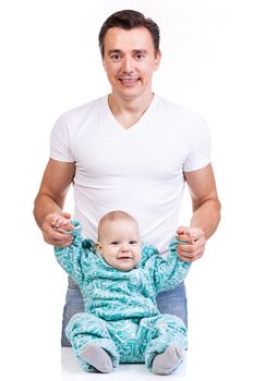 Young Caucasian father with baby son over white background
