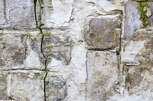 old brick wall texture background with worn off paint