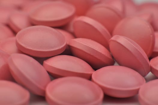 Scattering of pink tablets.