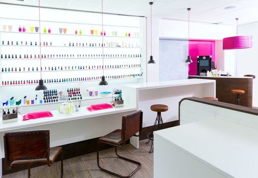 Nail and pedicure saloon modern with nail polish colorful in a row on white background