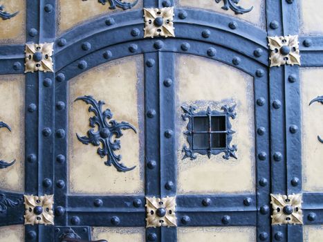 detailed fragment of ancient door from famous Neues Rathaus (New City Hall) building in Munich, Germany
