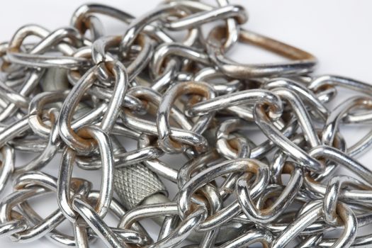 Close up of steel chain links, shallow depth of field 