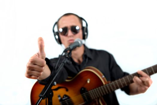 the guitarist is ready for the record isolated on white background