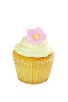 Isolated birthday cupcake with sing;e pink flower. Clipping path included.