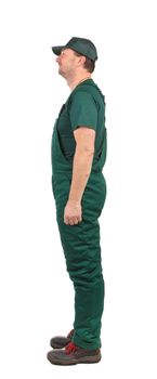 Man in green  overalls on a white background