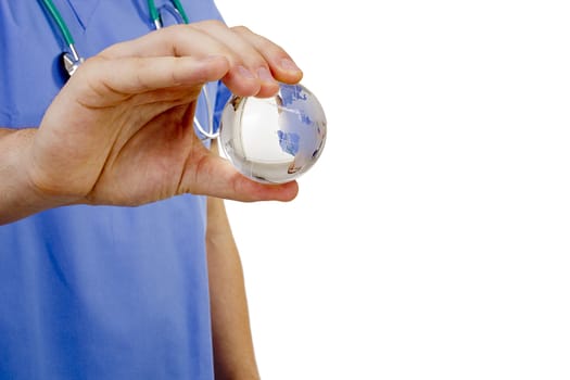 Doctor hand holding a symbolic globe. Global medicine.