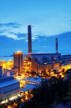 Gas storage spheres tank in petrochemical plant in sunset 