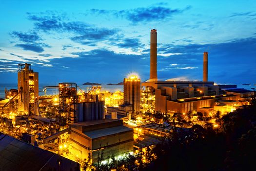 Gas storage spheres tank in petrochemical plant in sunset 