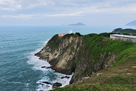White small lighthouse. Hong Kong