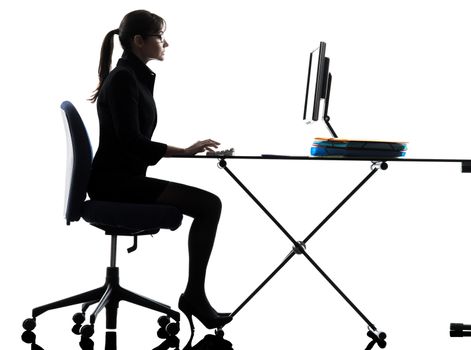 one business woman computer computing typing silhouette studio isolated on white background
