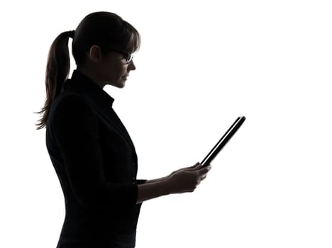 one business woman computer computing digital tablet silhouette studio isolated on white background
