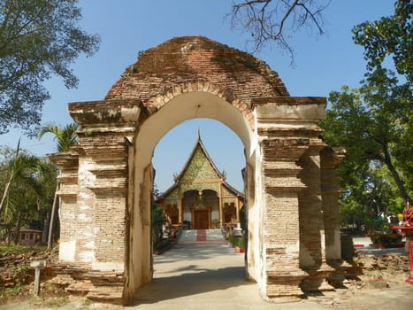 Old door entrance to wat tamnuk temple,Chiangmai