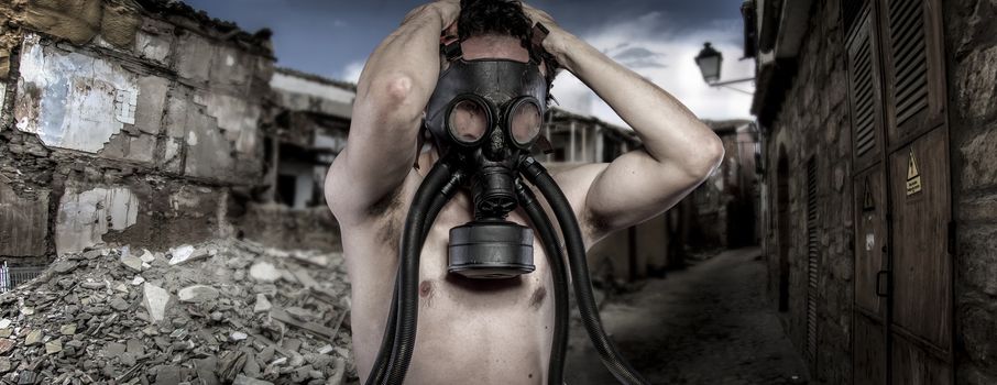 Toxic.Environmental disaster. Post apocalyptic survivor in gas mask