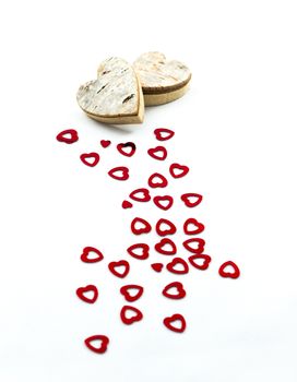 Red hearts and wooden hearts for Valentines day and love concept