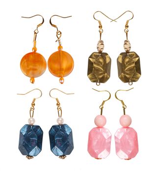 Earrings made of plastic Imitation pearl Isolated on white background. Collage
