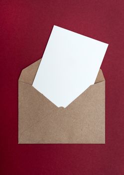 brown envelope on a red background