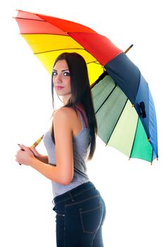 side portrait of beautiful brunette female with rainbow umbrella over white background 