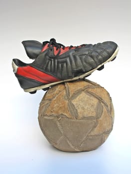 One old football ball and one torn boot:







One Old football ball and one torn boot.