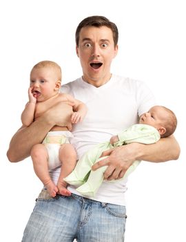 Smiling young man with two baby boys over white background