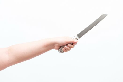 Asian woman holding large knife, isolated