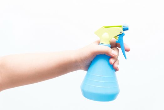 Asian woman holding a water sprayer for ironing, isolated