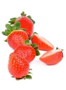 Fresh Ripe Strawberries Full Body In a Row and Halves isolated on white background