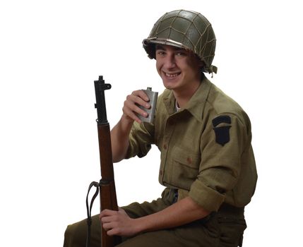 young American soldier takes a sip of alcohol, he have a M1 gun