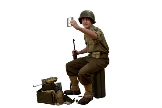 young American soldier takes a sip of alcohol, he have a M1 gun