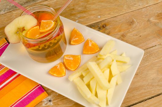 A kid dessert with apple slices resembling French fries