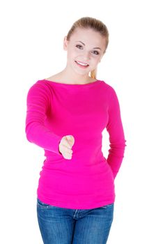 Young casual woman showing welcome gesture. Giving a hand. Isolated on white.