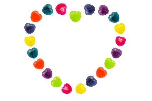 Heart shape confectionery is set in heart style on white background