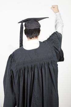 Asian student graduate raising his hand