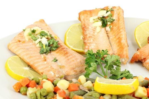 seafood salmon with salad and lemon