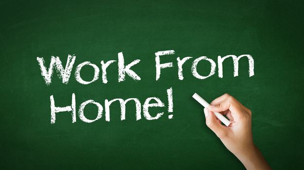 A person drawing and pointing at a Work From Home Chalk Illustration