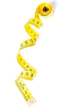 One enrolled measuring tape. Isolated on white.