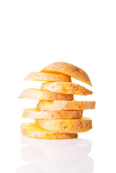 One sliced potatoe. Stack composition. Isolated on white.