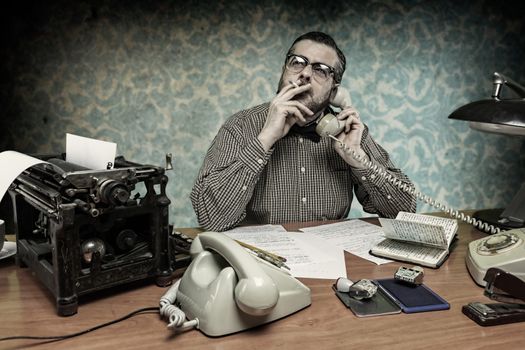  Secretary smoking a cigarette while talking on the phone, 1960's scene