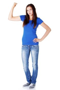 Young beautiful woman showing her strenght and muscle. Isolated on white.