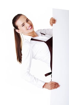 Attractive waitress holding copy space. Isolated on white.