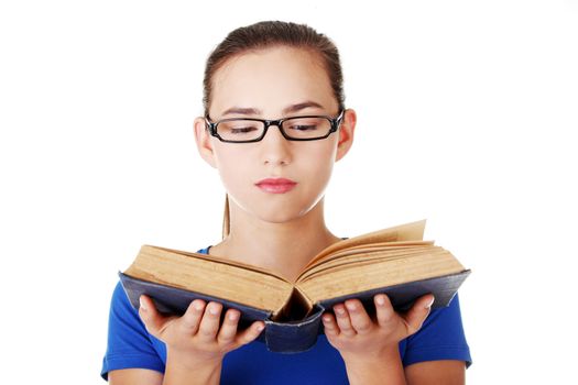 Young woman student with book. Isolated on white.